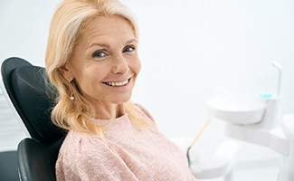 Lab technician carving dentures