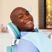 man getting a dental checkup to avoid dental emergencies in Reno